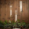 Set of 3 Tall Gold Metal Clear Glass Taper Candlestick Holders, Hurricane Candle Stands With Glass Chimney Candle Shades 16″, 20″, 24″