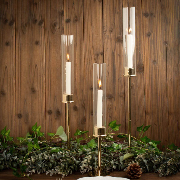 Set of 3 Tall Gold Metal Clear Glass Taper Candlestick Holders, Hurricane Candle Stands With Glass Chimney Candle Shades 16″, 20″, 24″